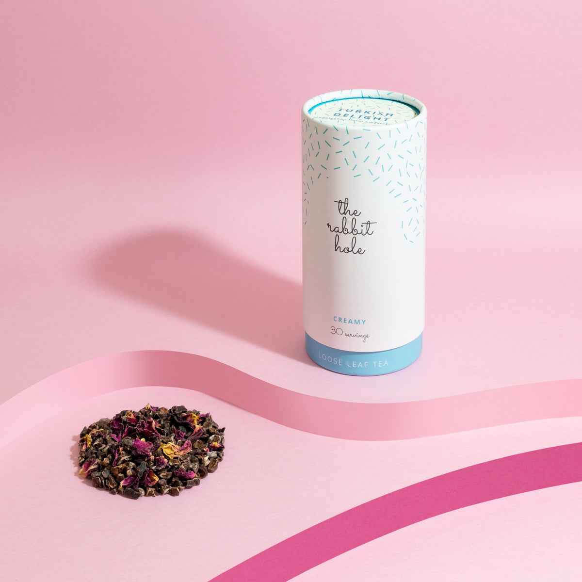 Turkish Delight Creamy loose leaf tea by The Rabbit Hole - Australian Made Tea - canister on a pink background