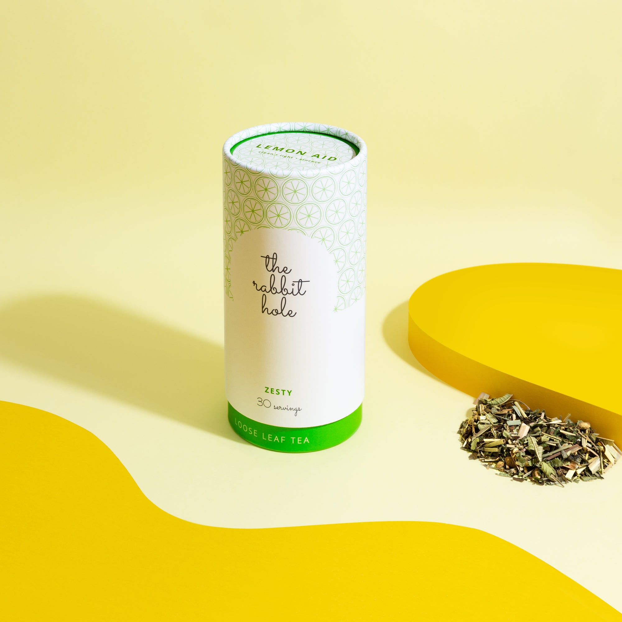 Lemon Aid loose leaf tea by The Rabbit Hole - Australian Made Tea. Tea canister on colourful yellow background