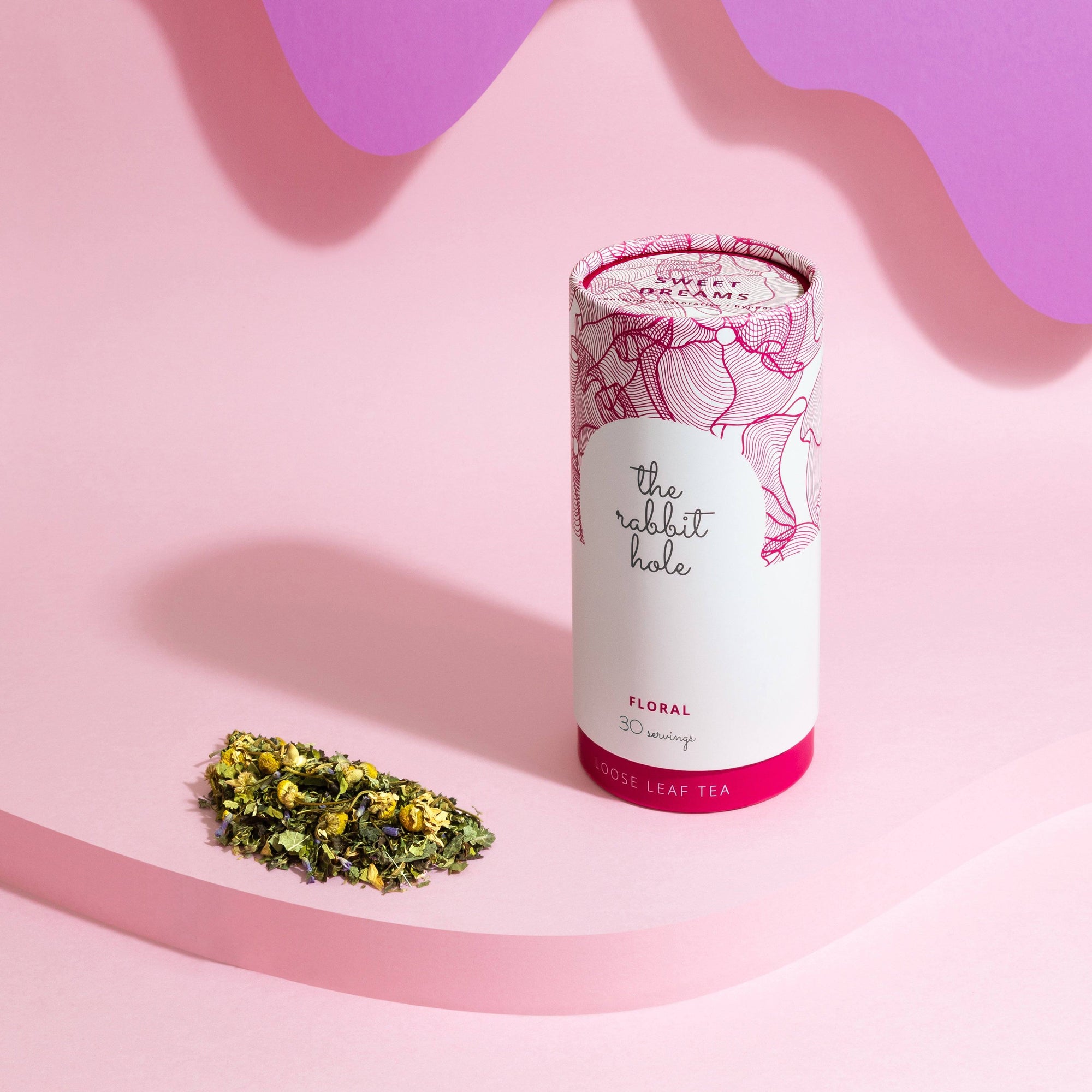 Sweet Dreams Floral loose leaf tea by The Rabbit Hole - Australian Made Tea - canister on a pink and purple background