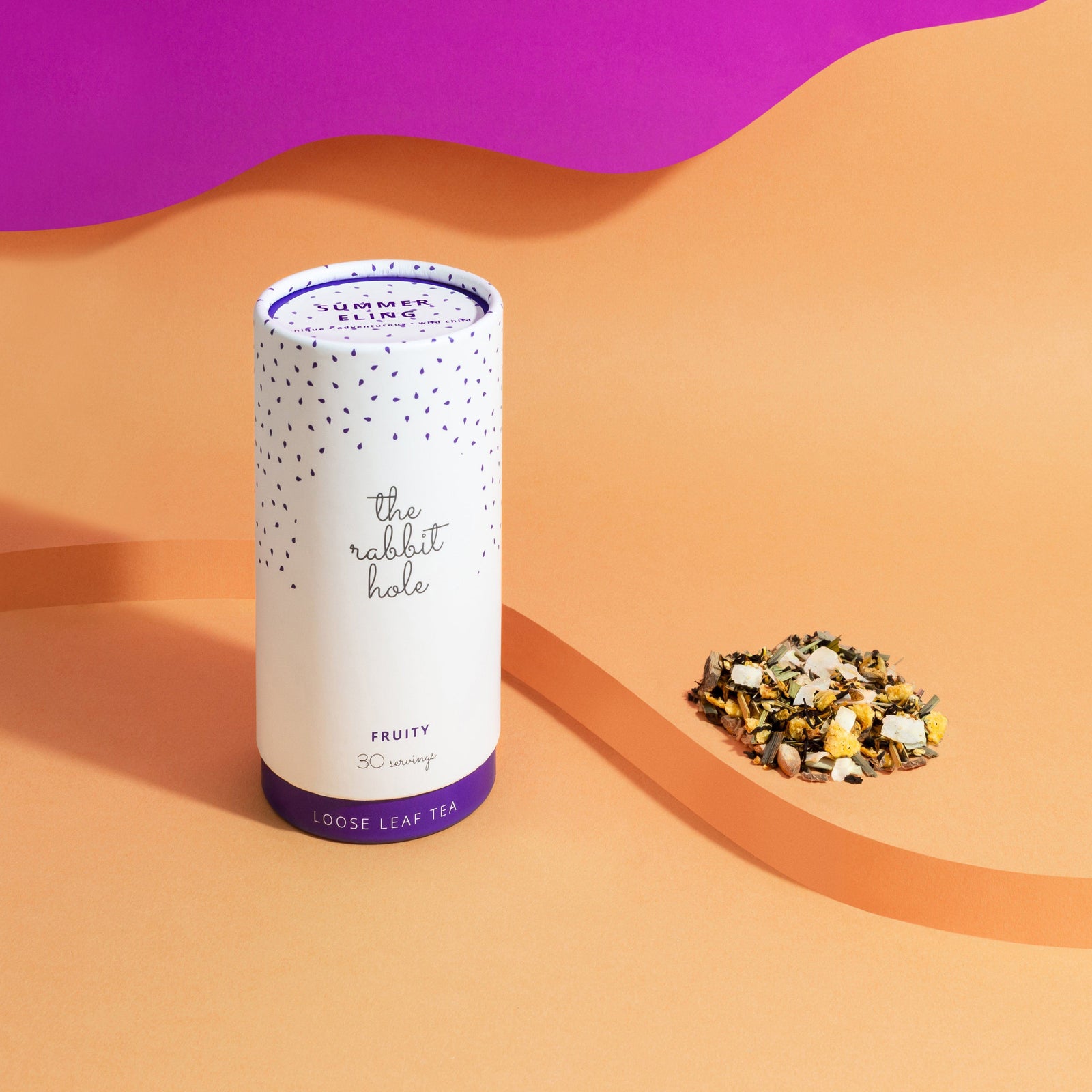 Summer Fling Fruity loose leaf tea by The Rabbit Hole - Australian Made Tea - canister on a colourful orange and pink background